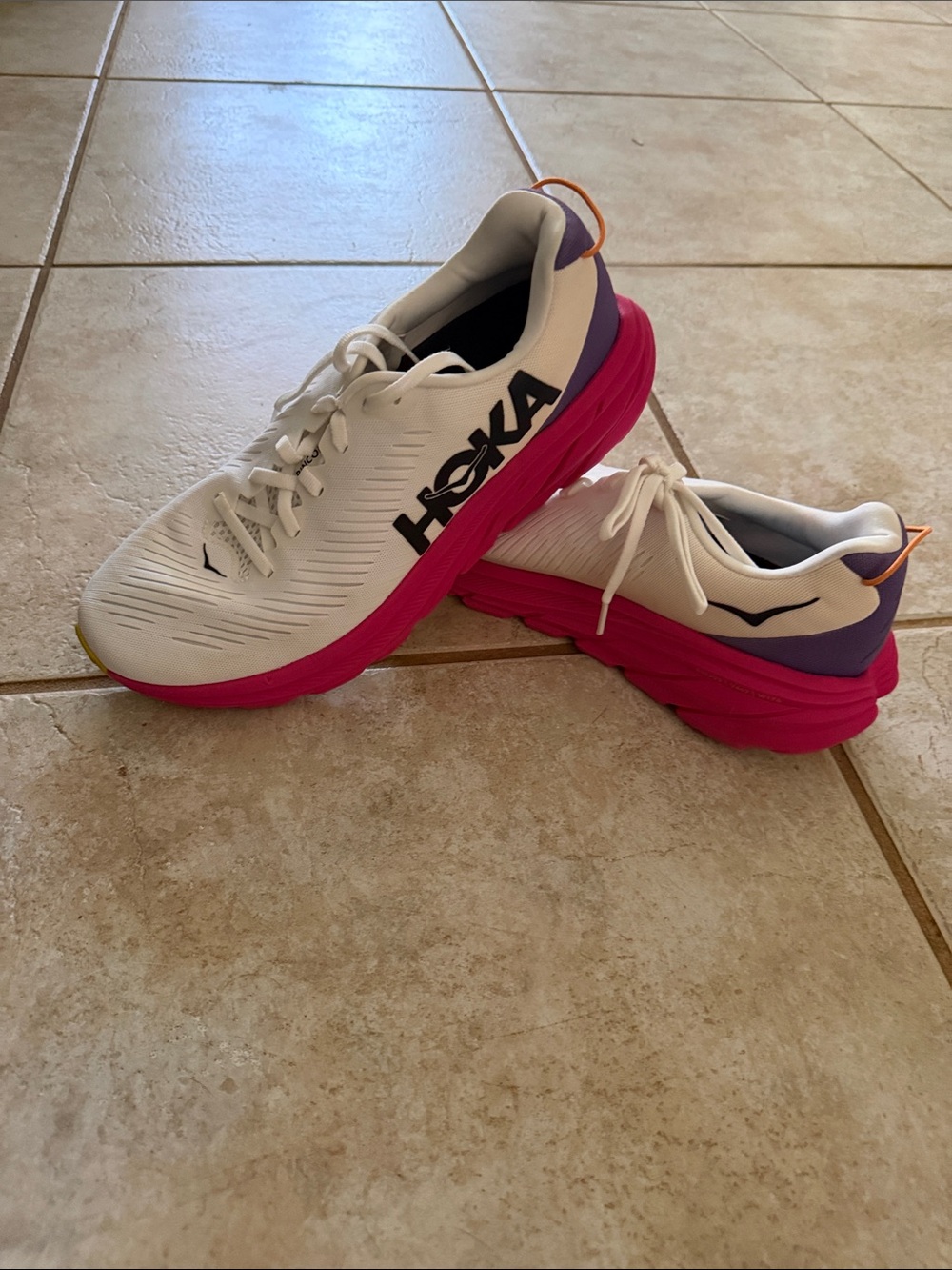 Hoka White Running Shoes with Pink Midsole and Purple Heel